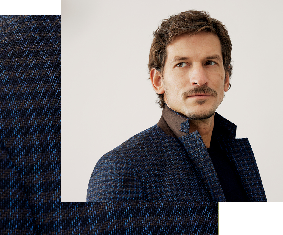 Man wearing Rodd and Gunn navy jacket.