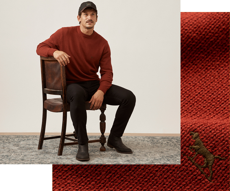 Man wearing a lightweight cream colour knit.