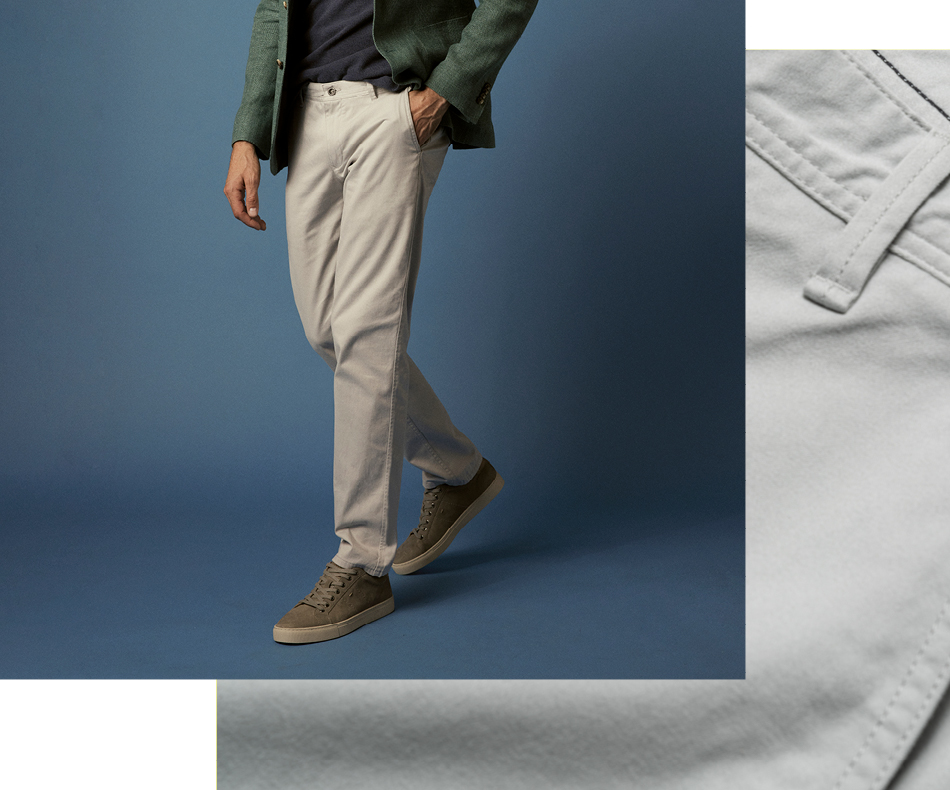 Man sitting on A stool wearing Rodd and Gunn dark chinos.