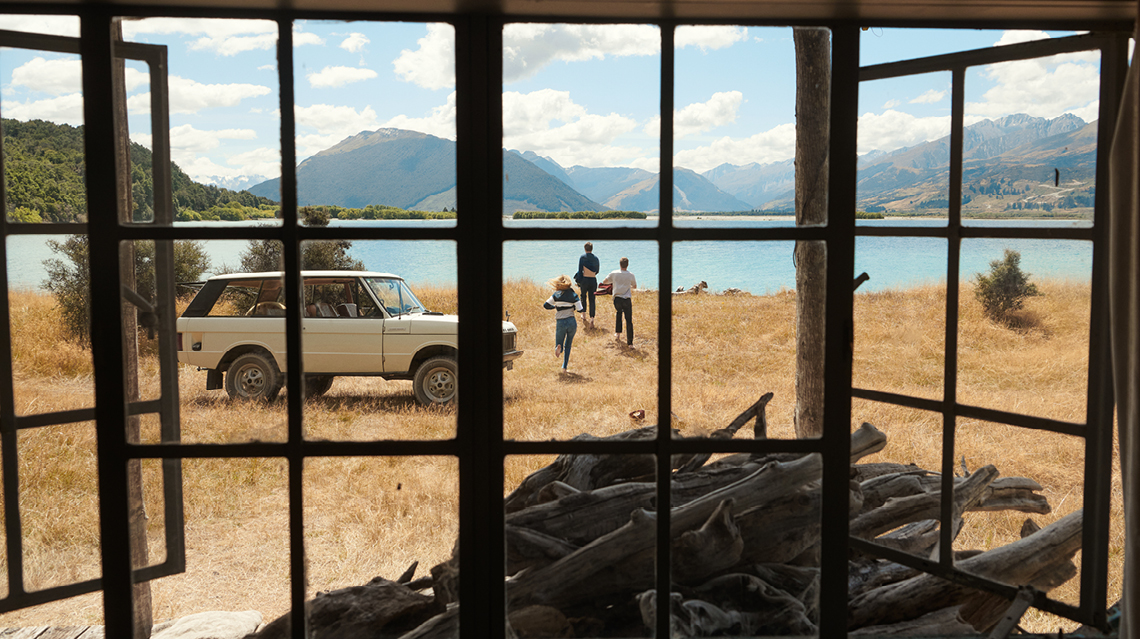 Rodd & Gunn's Journey to Paradise campaign shoot of a Range Rover by the lake.