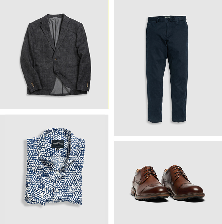 Men's tailored jacket, printed shirt, brown leather shoes and navy coloured chinos.