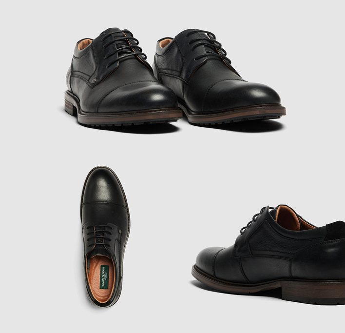 Men's black low-cut classic leather dress shoes with leather laces.