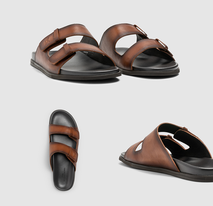 Men's brown leather strap slides with black leather sole featuring adjustable straps and English Pointer logo.