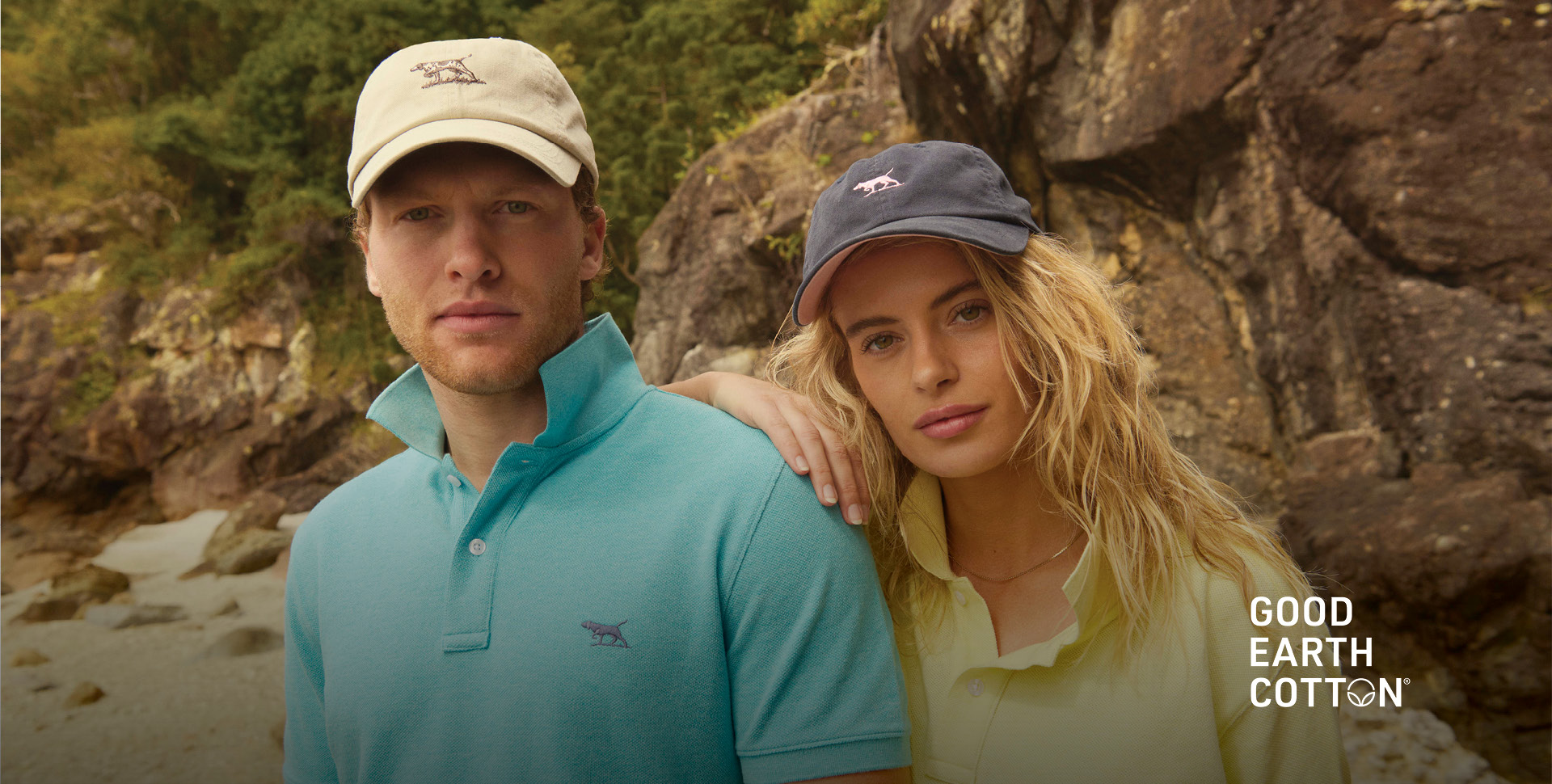 Two models with a rocky background wearing the Gunn polos