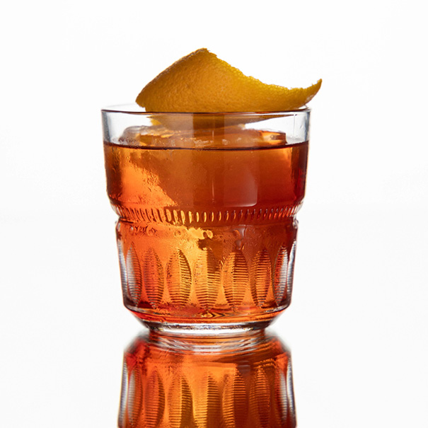 Artfully arranged meal on a clean plate, showcasing fresh ingredients and fine dining presentation.